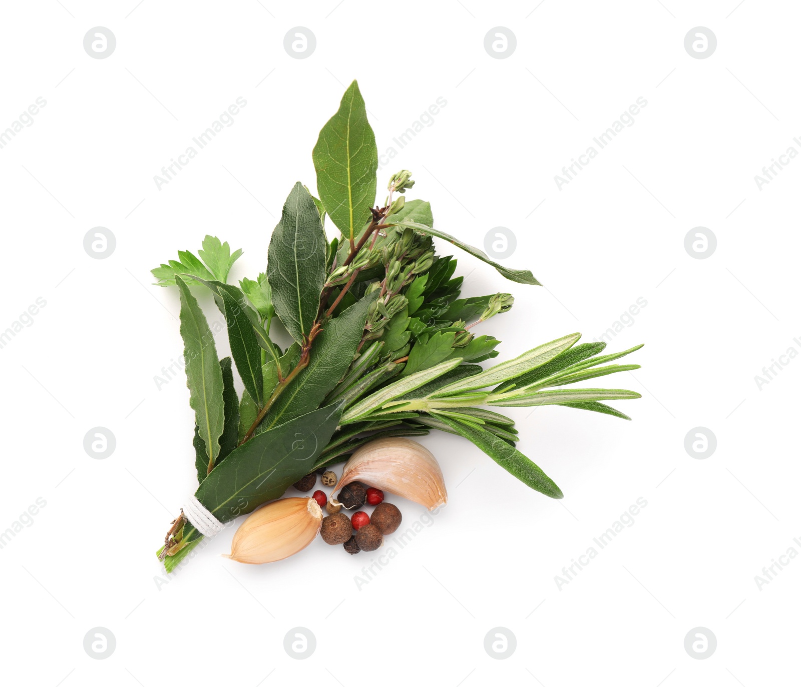 Photo of Bundle of aromatic bay leaves, different herbs and spices isolated on white, top view