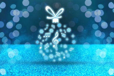 Image of Christmas ball made of music notes and snowflakes against blue background. Bokeh effect