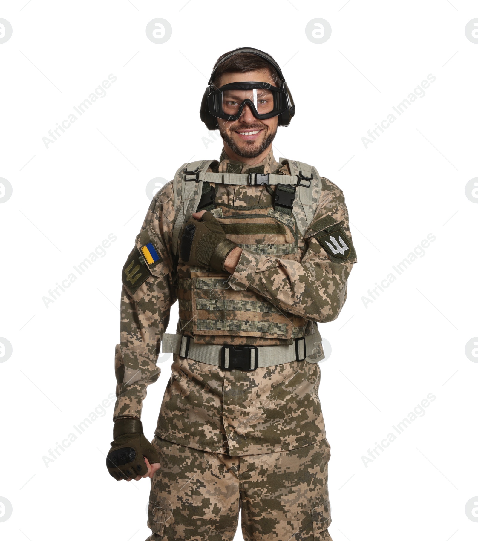 Photo of Soldier in Ukrainian military uniform, tactical goggles and headphones on white background