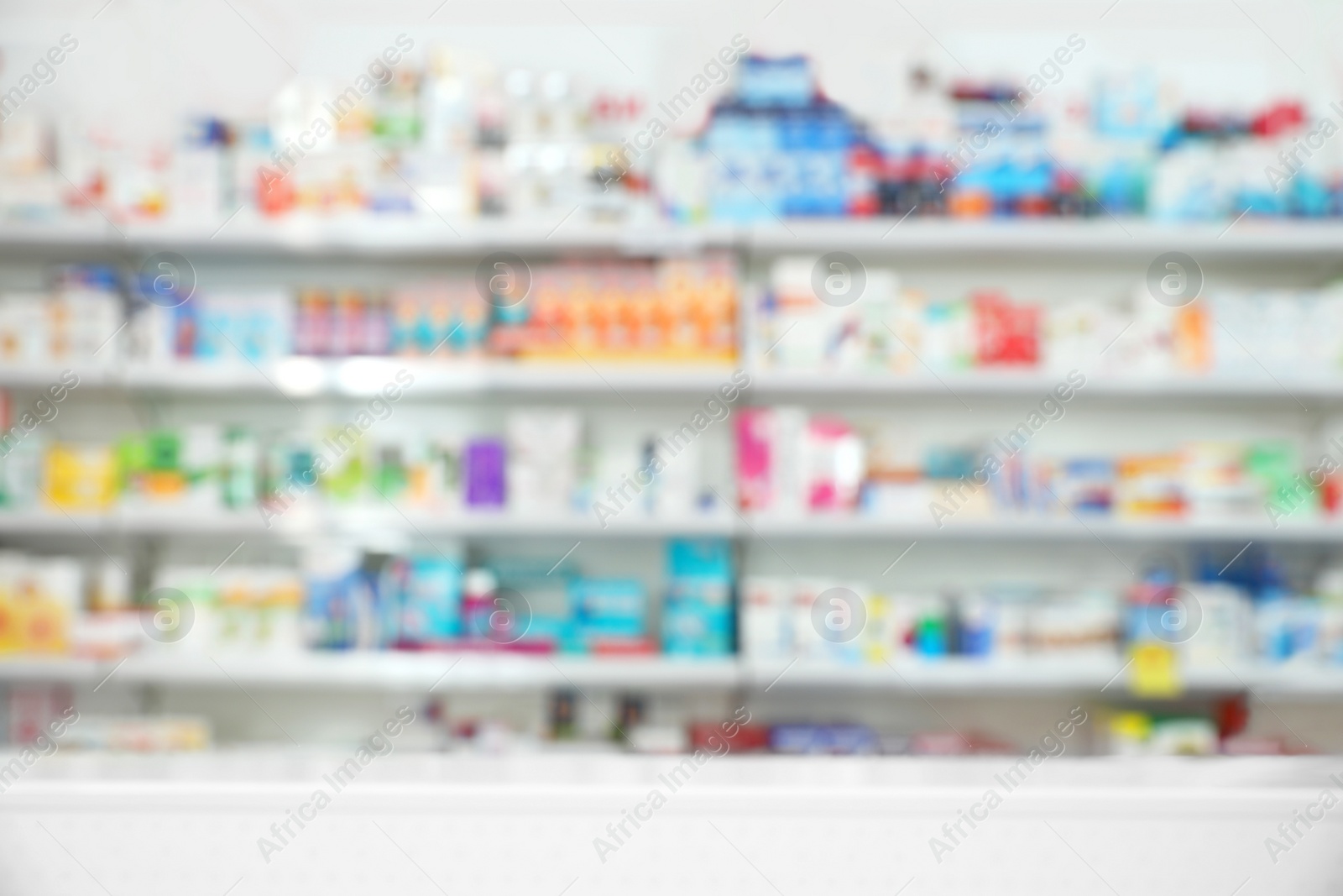 Image of Blurred view of shelves with pharmaceuticals in modern drugstore