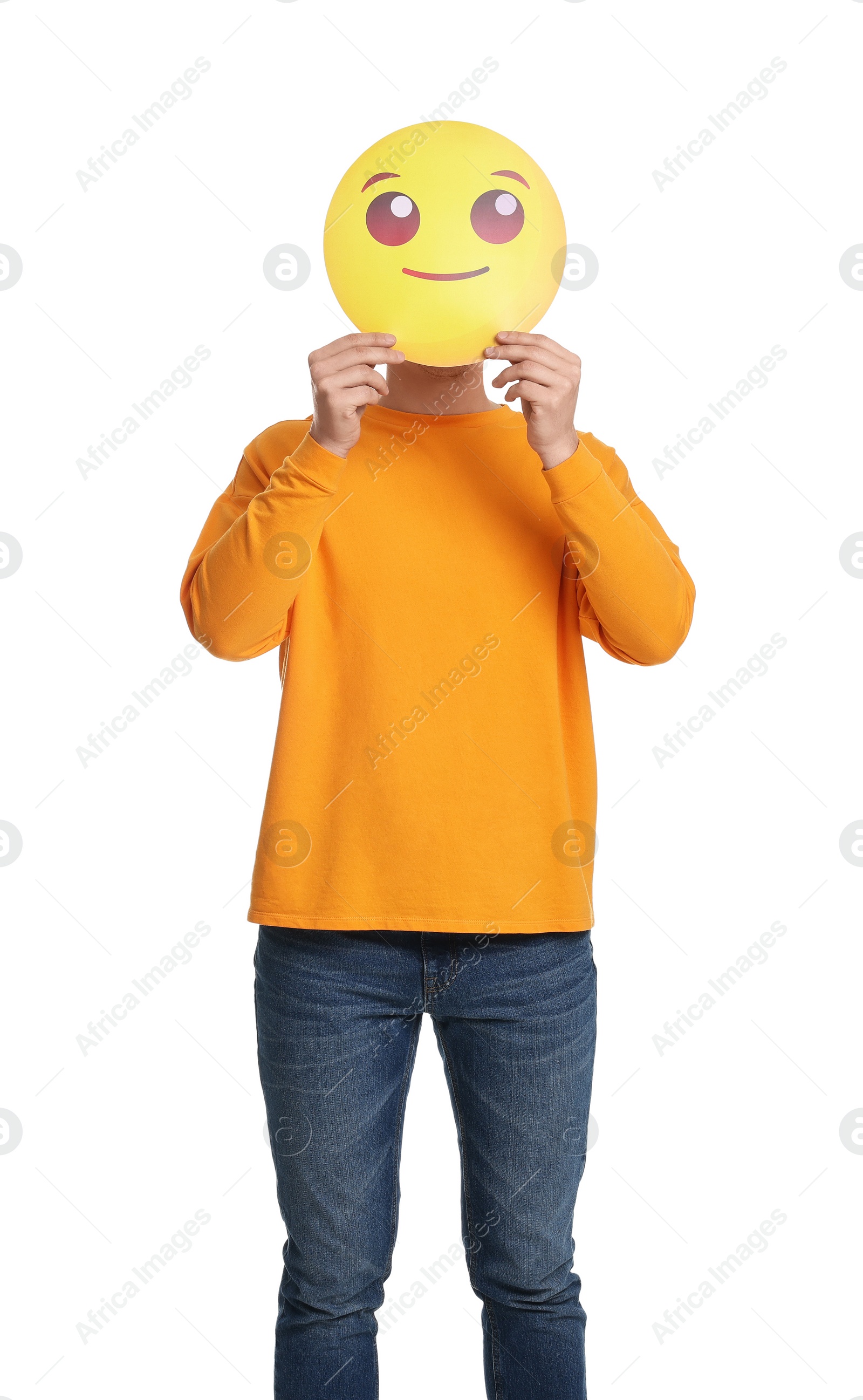 Photo of Man covering face with smiling emoticon on white background