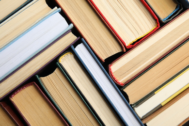 Photo of Many different hardcover books as background, top view