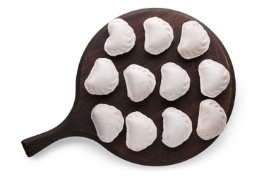 Raw dumplings (varenyky) on white background, top view