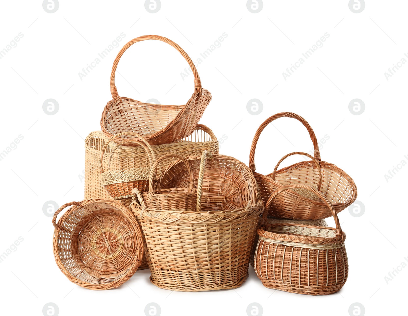 Photo of Many different wicker baskets isolated on white