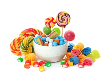 Composition with many different yummy candies on white background