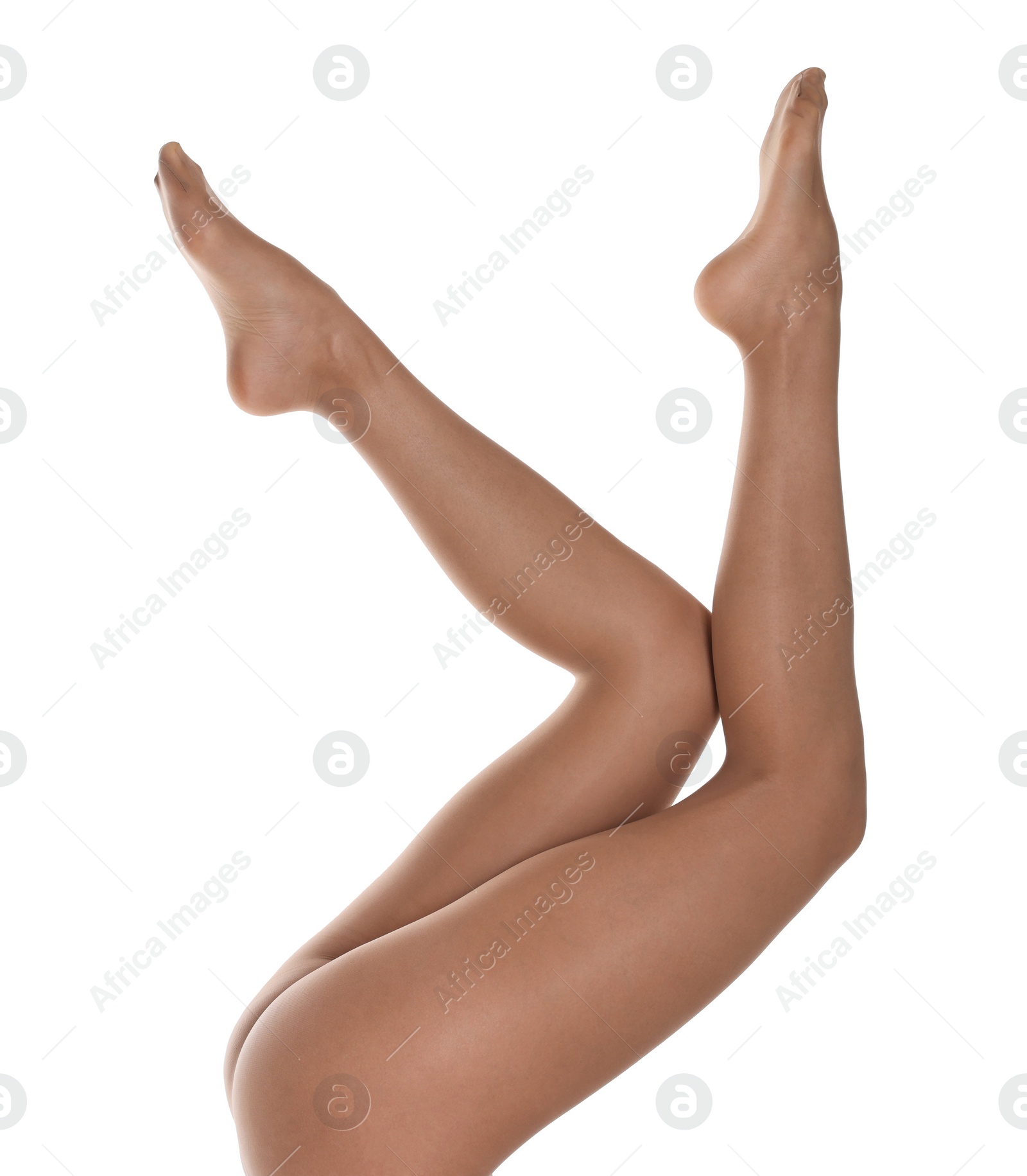 Photo of Woman with beautiful long legs wearing tights on white background, closeup