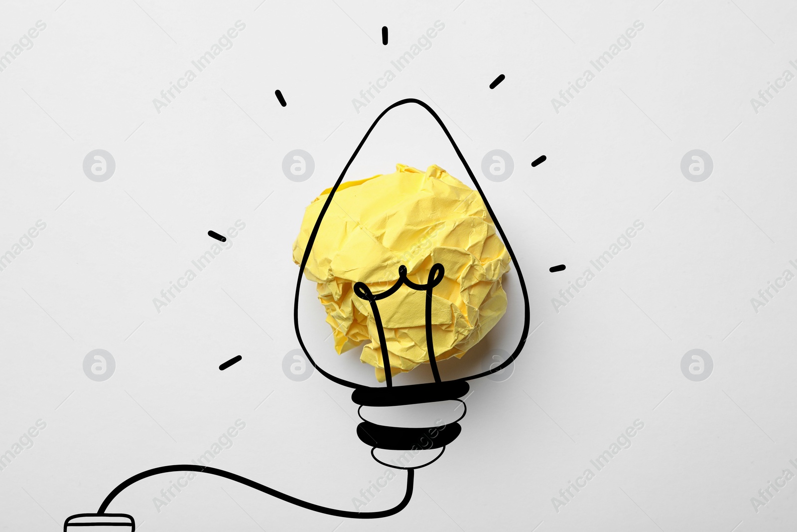 Image of Idea. Illustration of light bulb around crumpled paper ball on white background, top view