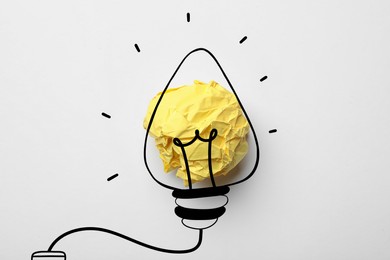 Image of Idea. Illustration of light bulb around crumpled paper ball on white background, top view