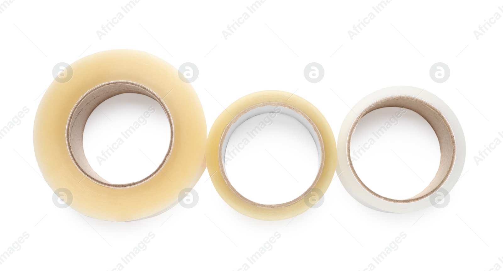 Photo of Rolls of adhesive tape on white background, top view