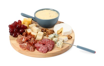 Photo of Fondue with tasty melted cheese, fork and different snacks isolated on white