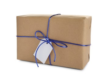 Parcel wrapped in kraft paper with tag on white background