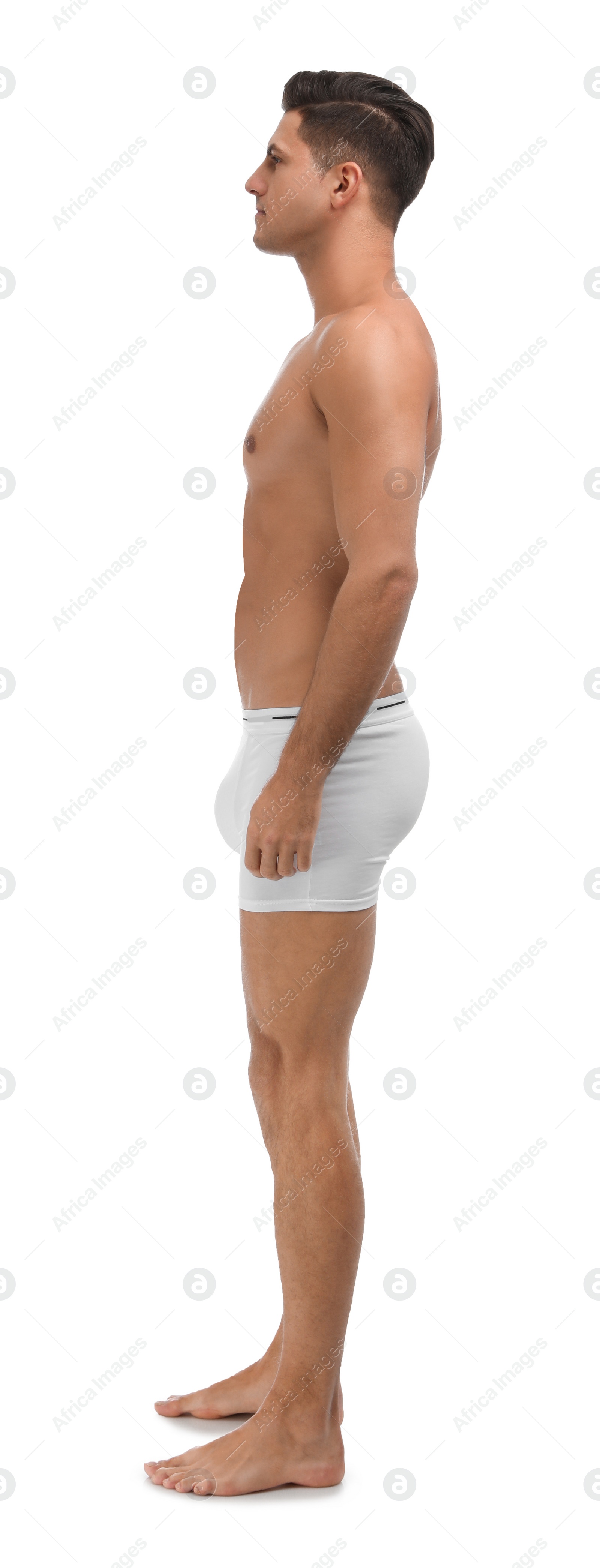 Photo of Handsome man in underwear on white background