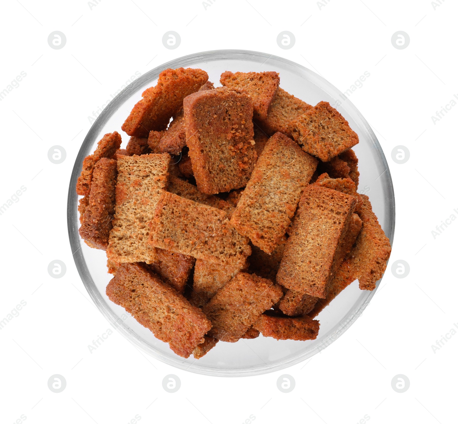 Photo of Crispy rusks in bowl isolated on white, top view