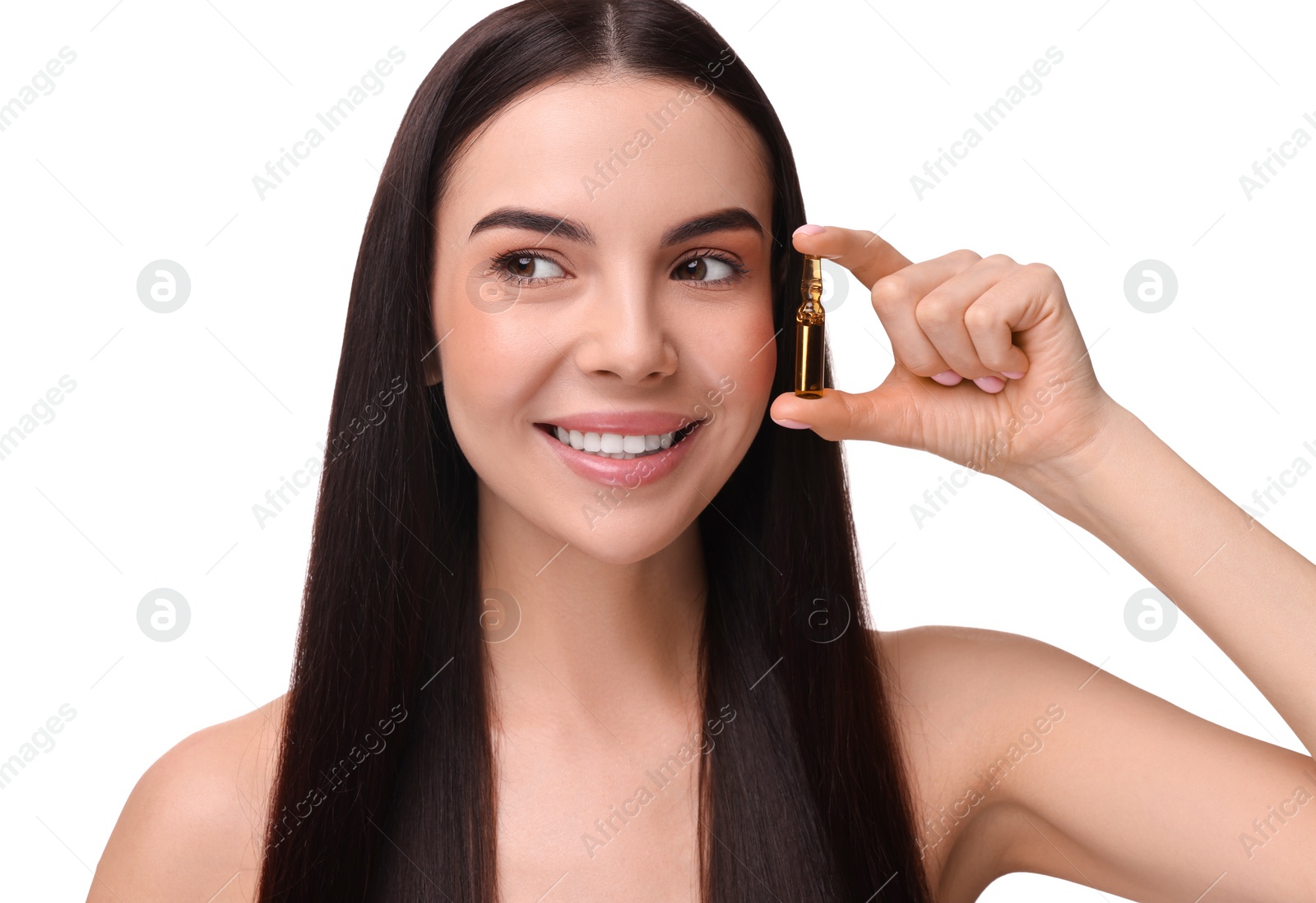 Photo of Beautiful young woman holding skincare ampoule on white background