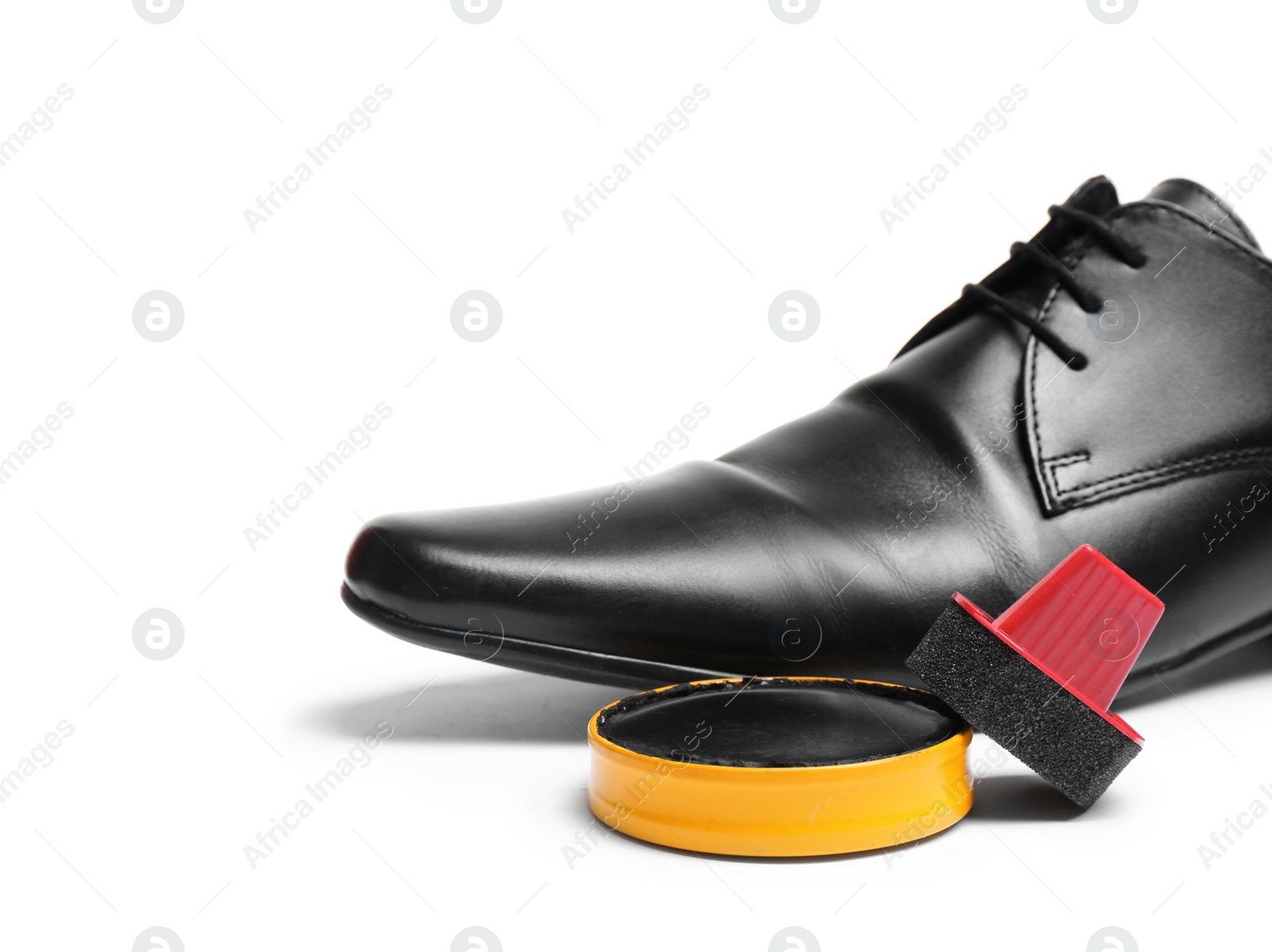 Photo of Stylish men's footwear and shoe care accessories on white background, closeup