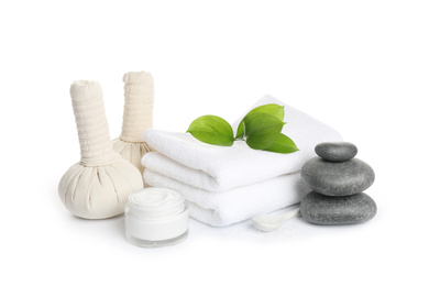 Photo of Beautiful spa composition with herbal bags on white background