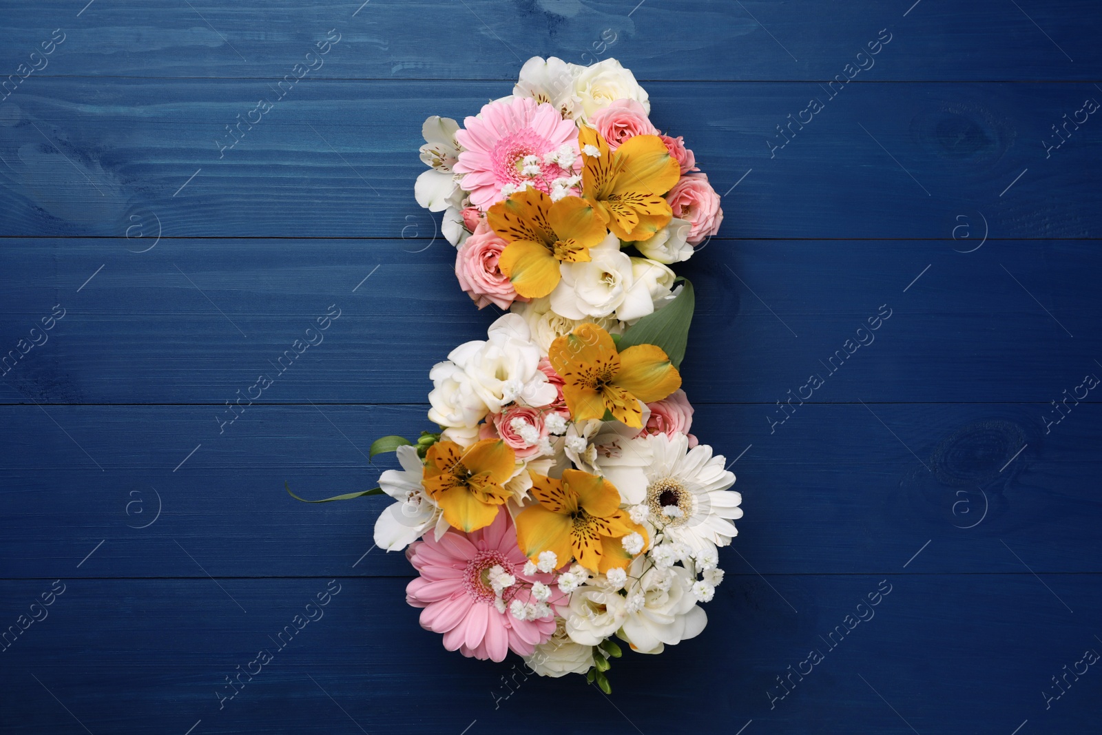 Photo of Number 8 made of beautiful flowers on blue wooden table, flat lay. International Women's day