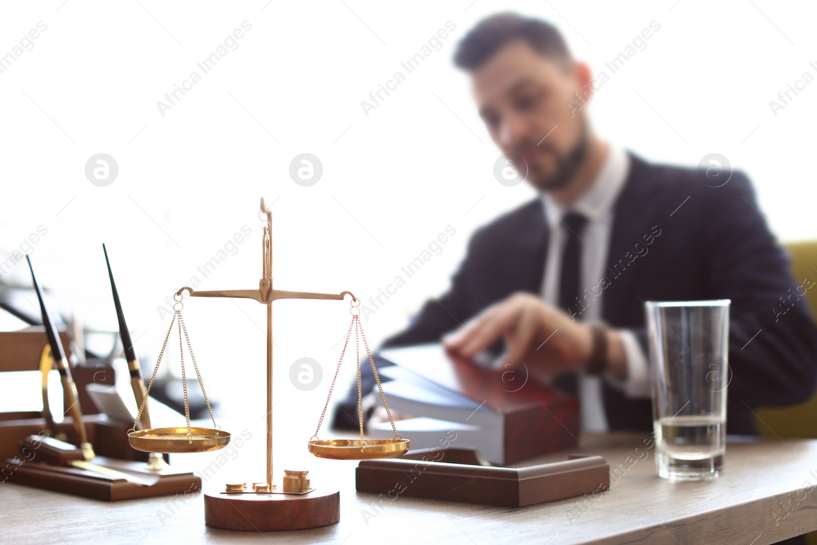 Photo of Male lawyer working in office