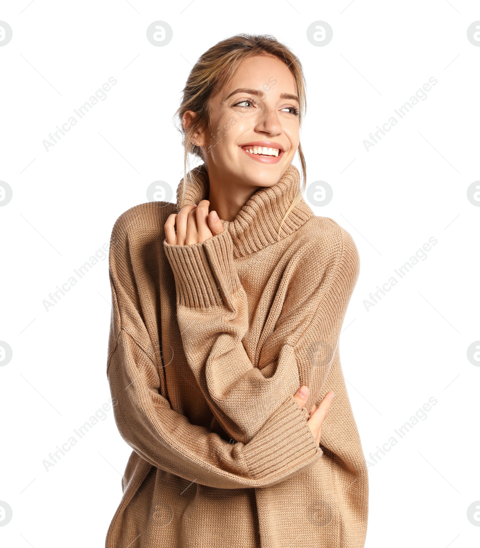 Photo of Beautiful young woman wearing knitted sweater on white background