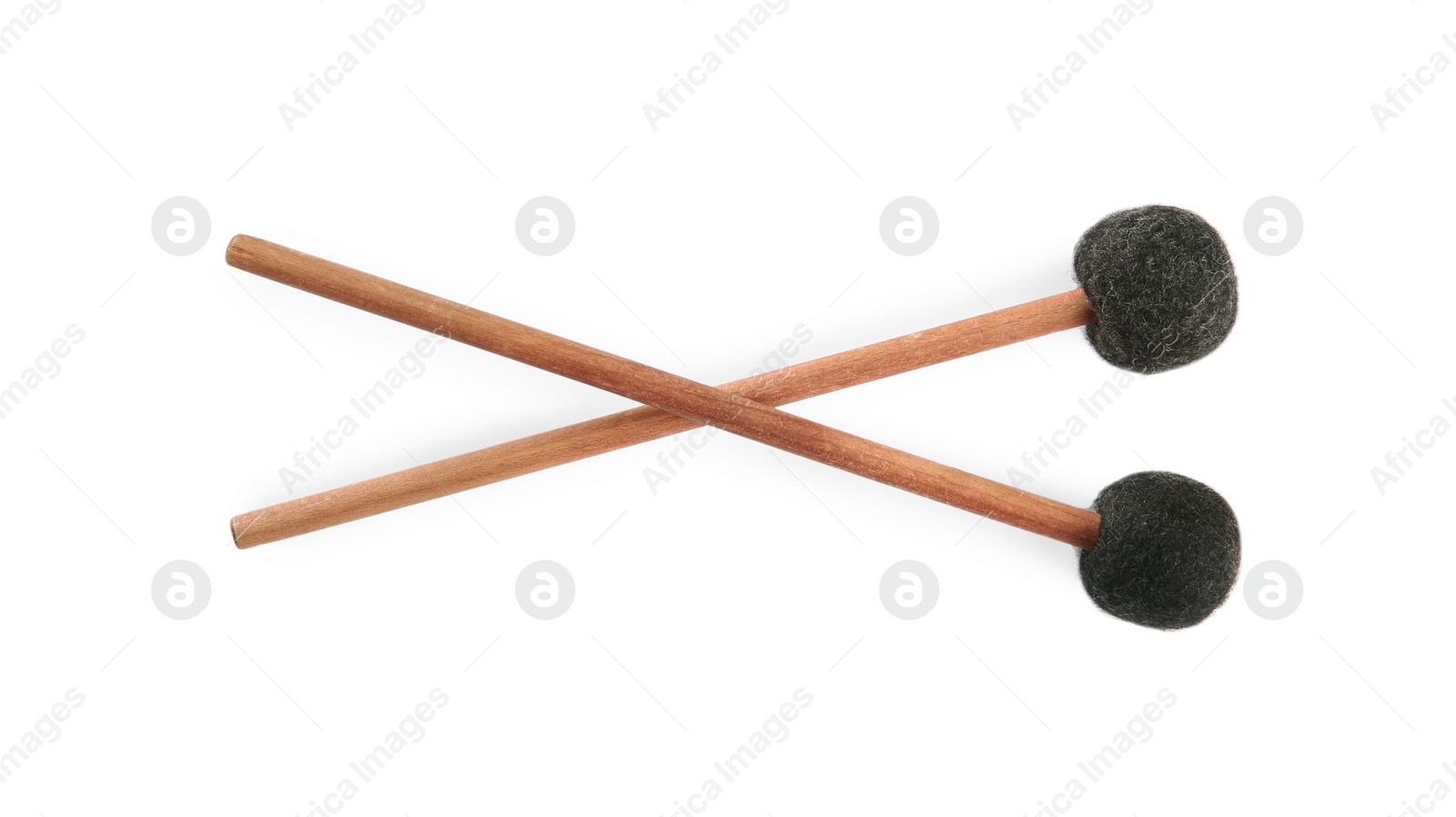 Photo of Wooden bass drumsticks on white background, top view