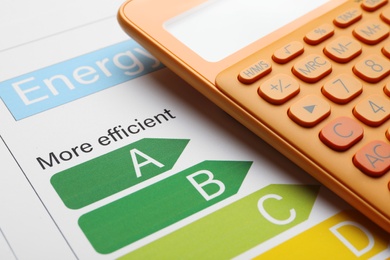 Photo of Energy efficiency rating chart and calculator, closeup