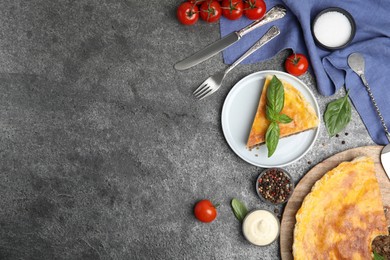 Photo of Delicious pie with minced meat served on grey table, flat lay. Space for text