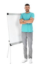 Professional business trainer near flip chart board on white background