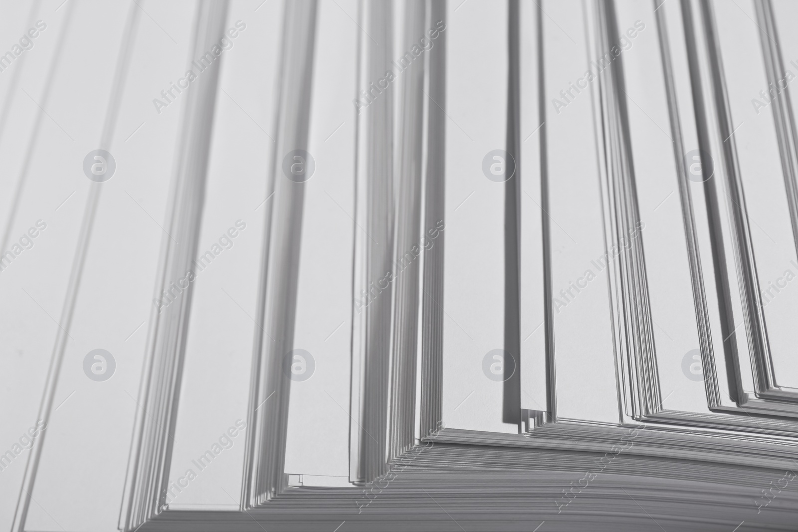 Photo of White paper sheets as background, closeup view