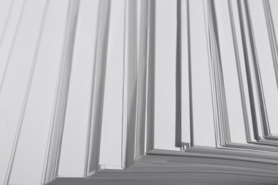 Photo of White paper sheets as background, closeup view