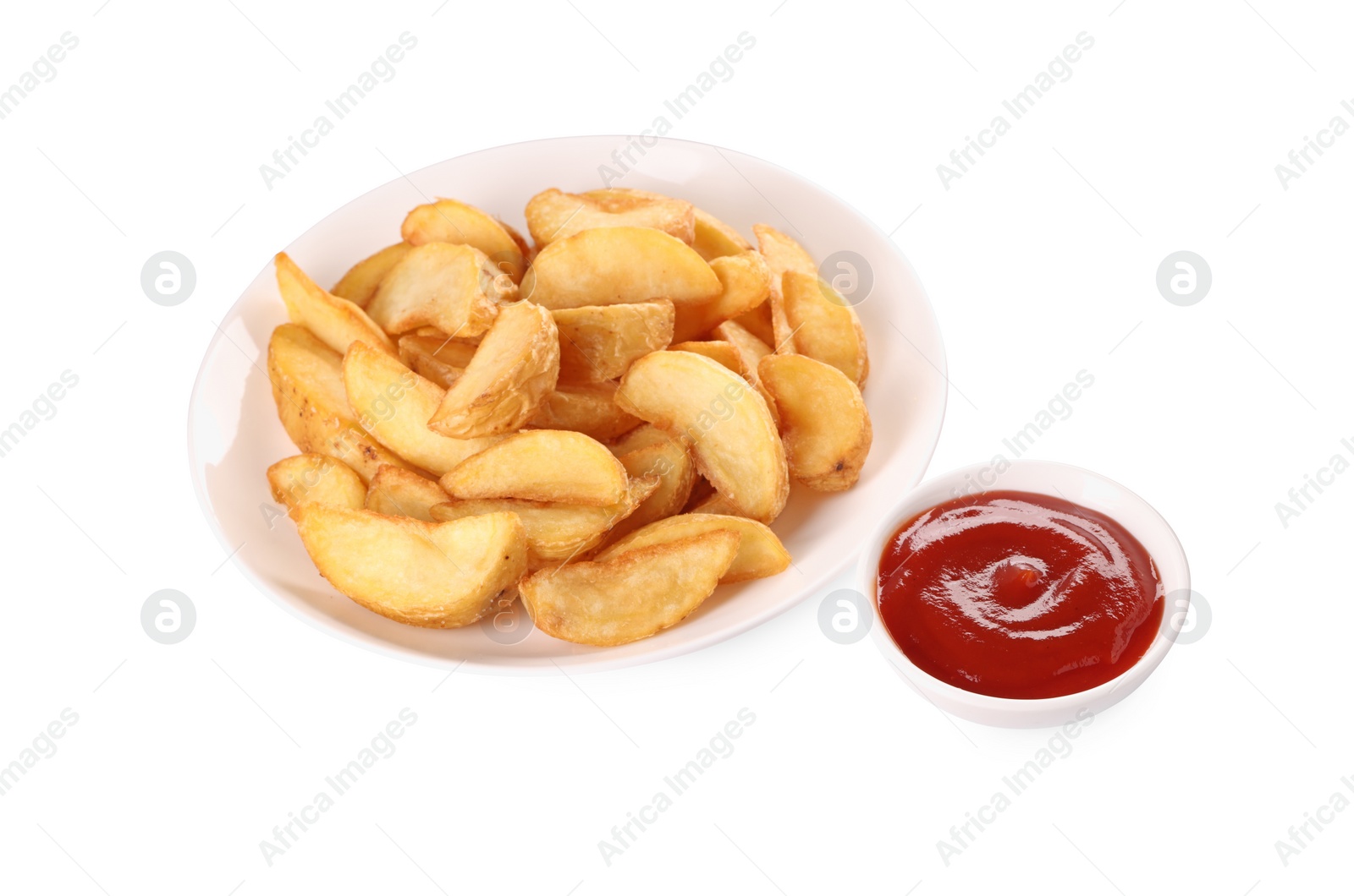 Photo of Delicious baked potato wedges and ketchup in bowl on white background