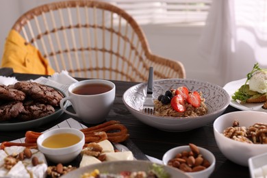 Many different dishes served on buffet table for brunch