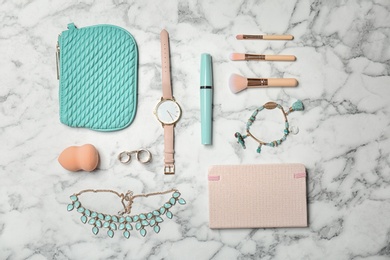 Photo of Flat lay composition with stylish accessories on marble background