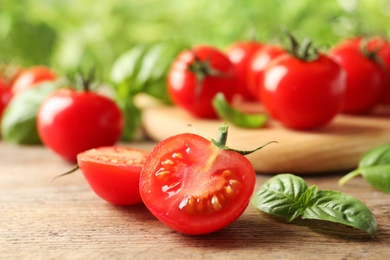 Fresh organic cherry tomatoes on wooden table