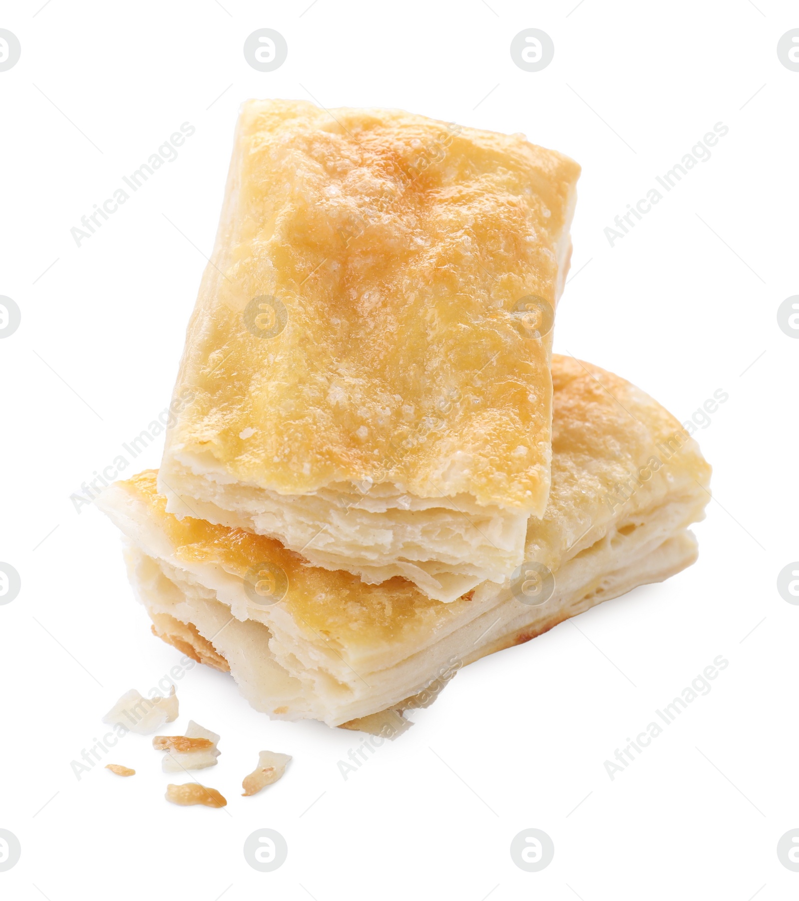 Photo of Delicious fresh puff pastries isolated on white