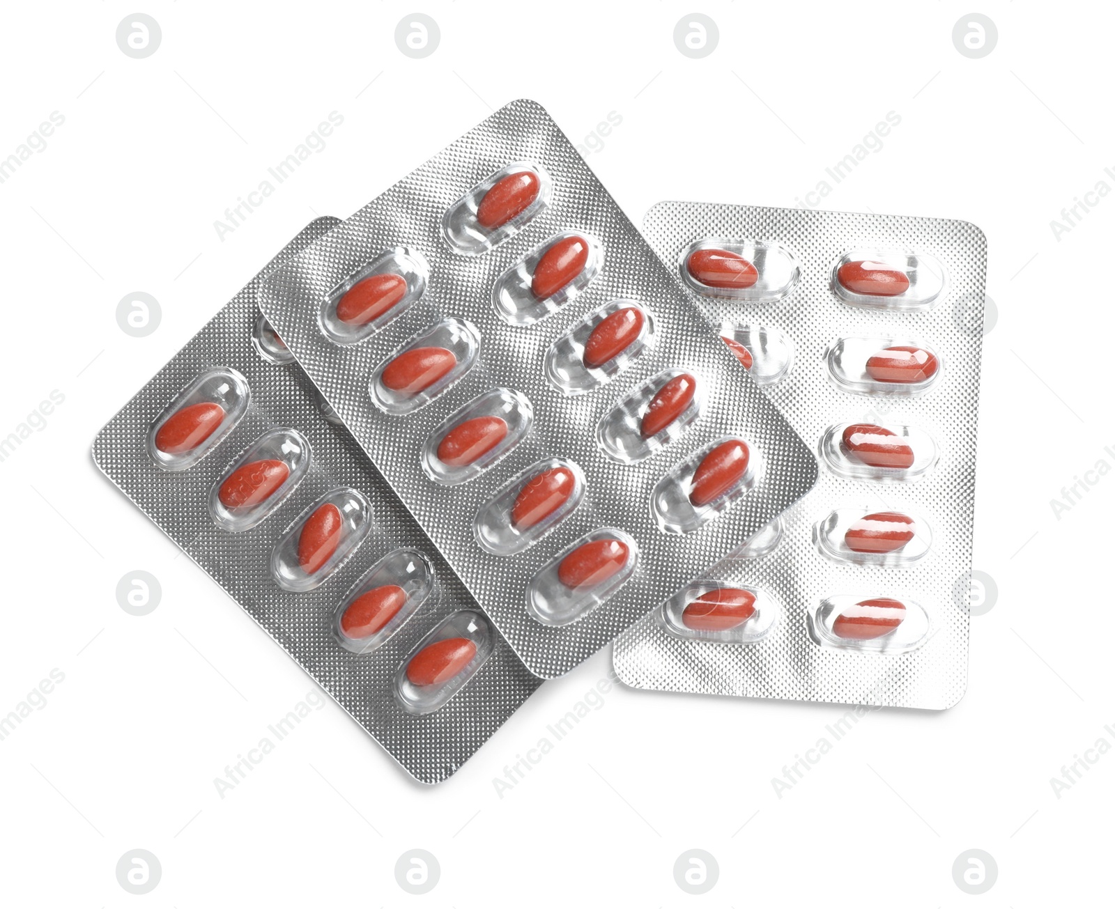 Photo of Pills in blister packs on white background, top view. Anemia concept