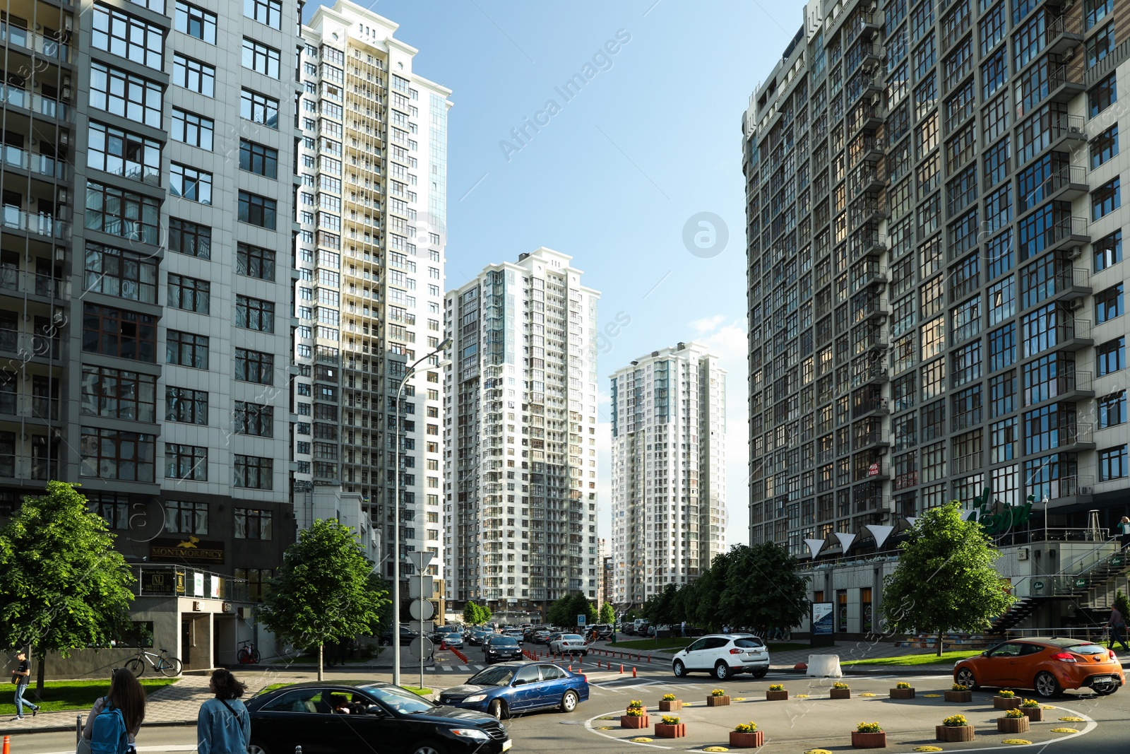 Photo of KYIV, UKRAINE - MAY 21, 2019: Beautiful view of modern housing estate in Pecherskyi district on sunny day