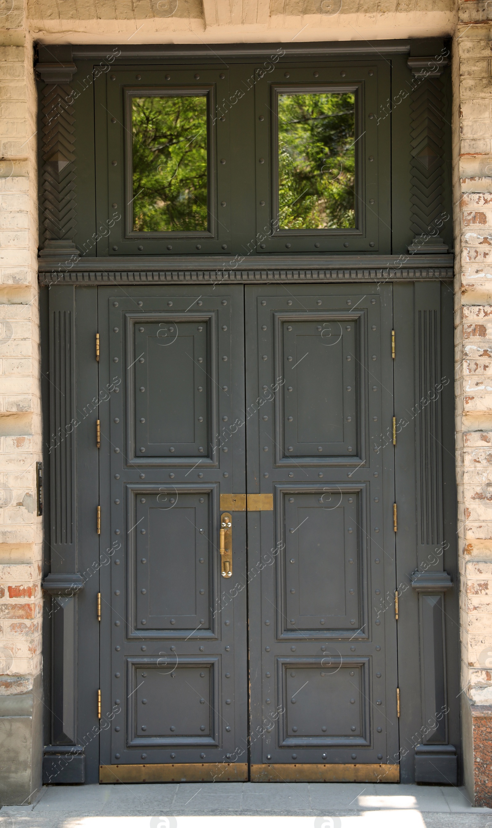 Photo of Building with vintage wooden door. Exterior design