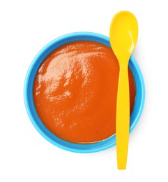 Delicious baby food in bowl and spoon isolated on white, top view