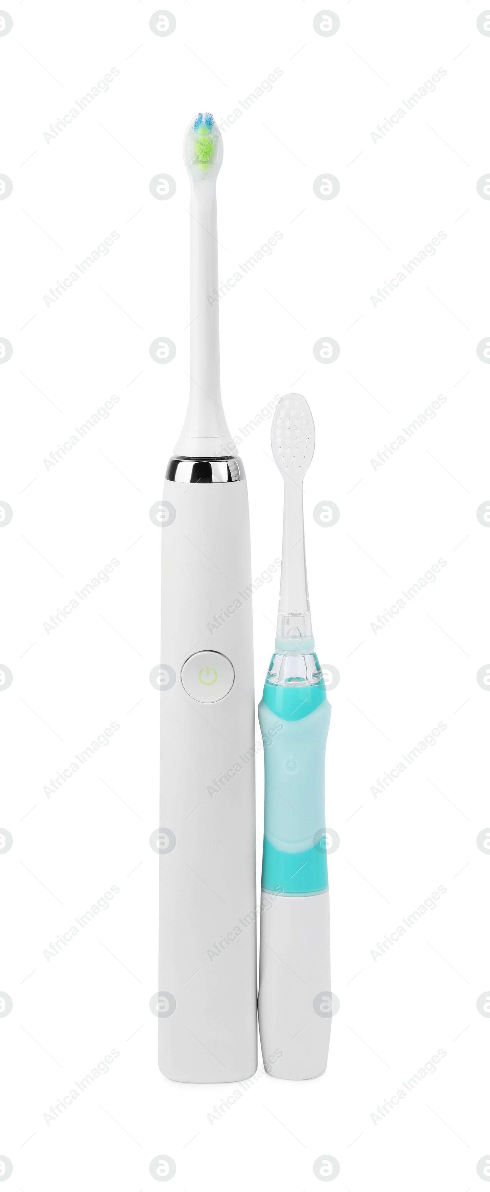 Photo of Electric toothbrushes on white background. Dental care