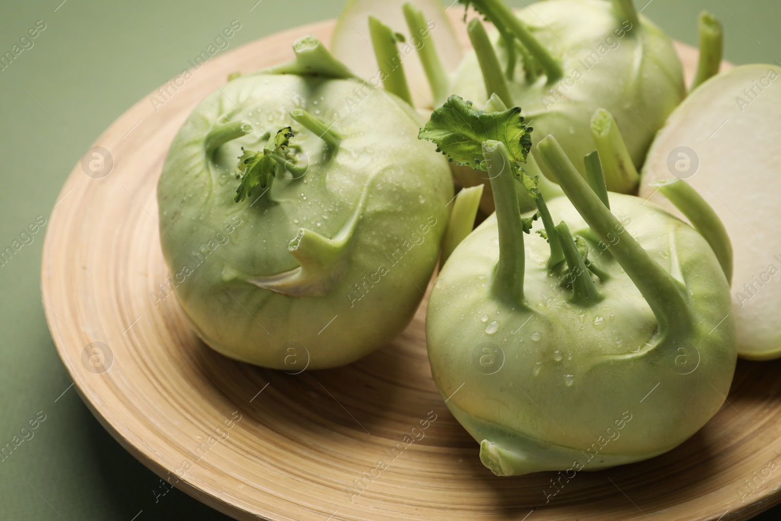 Photo of Ripe kohlrabi plants on plate, closeup view