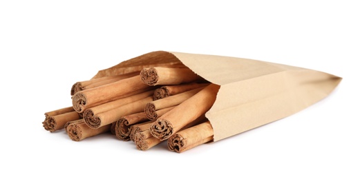 Aromatic dry cinnamon sticks on white background