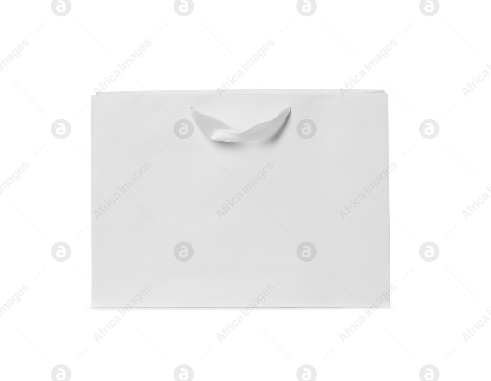 Photo of Paper shopping bag isolated on white. Mock up for design