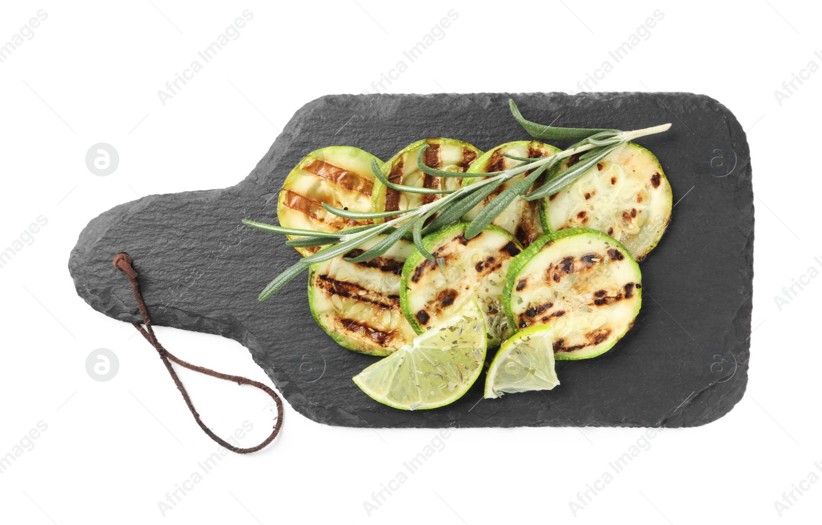 Photo of Delicious grilled zucchini slices served with lime and rosemary on white background, top view