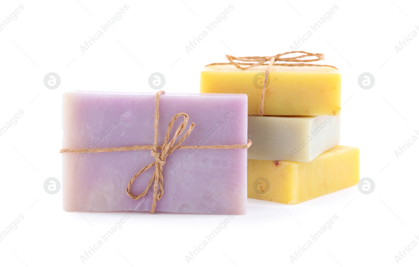 Photo of Different bars of organic handmade soap isolated on white