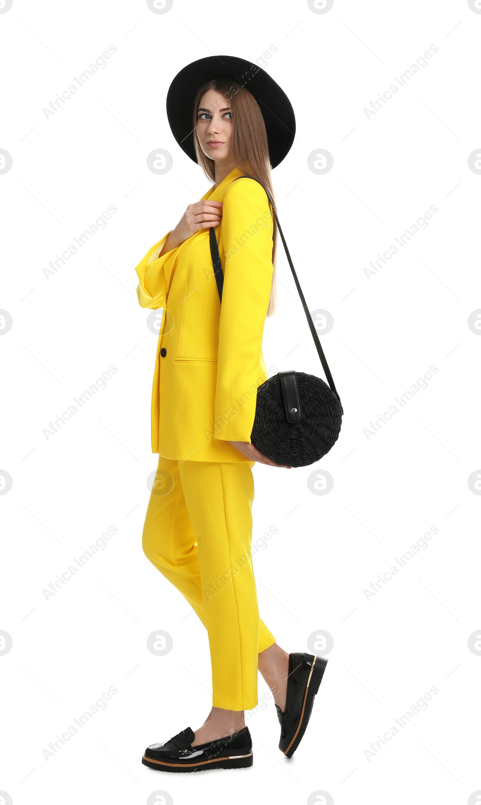 Photo of Beautiful young woman with stylish bag on white background