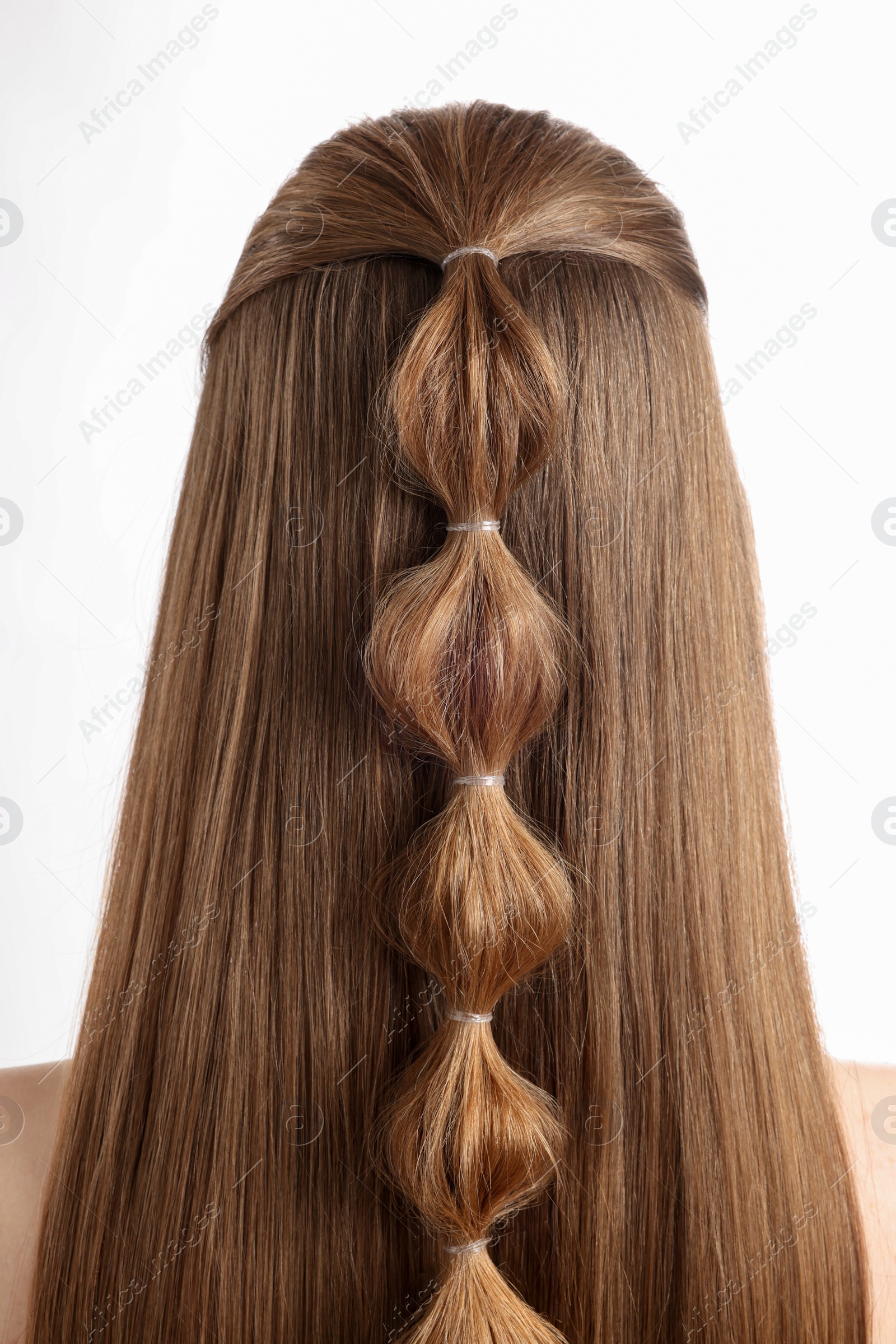 Photo of Woman with braided hair on white background, back view