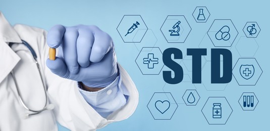 Image of STD prevention. Closeup view of doctor with suppository , abbreviation and different icons on light blue background, banner design