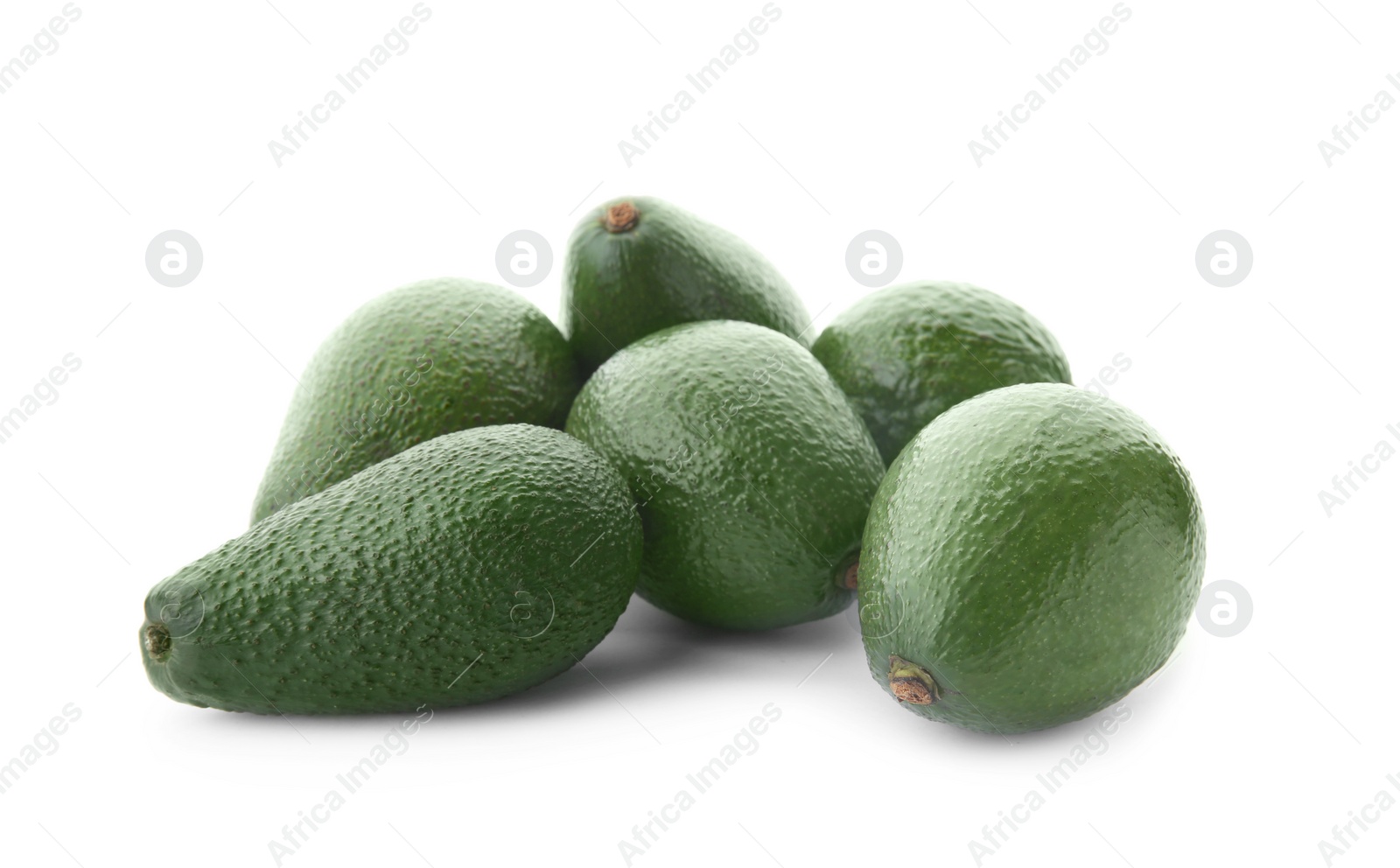 Photo of Ripe avocados on white background. Tropical fruit