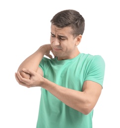 Photo of Young man suffering from pain in elbow on white background