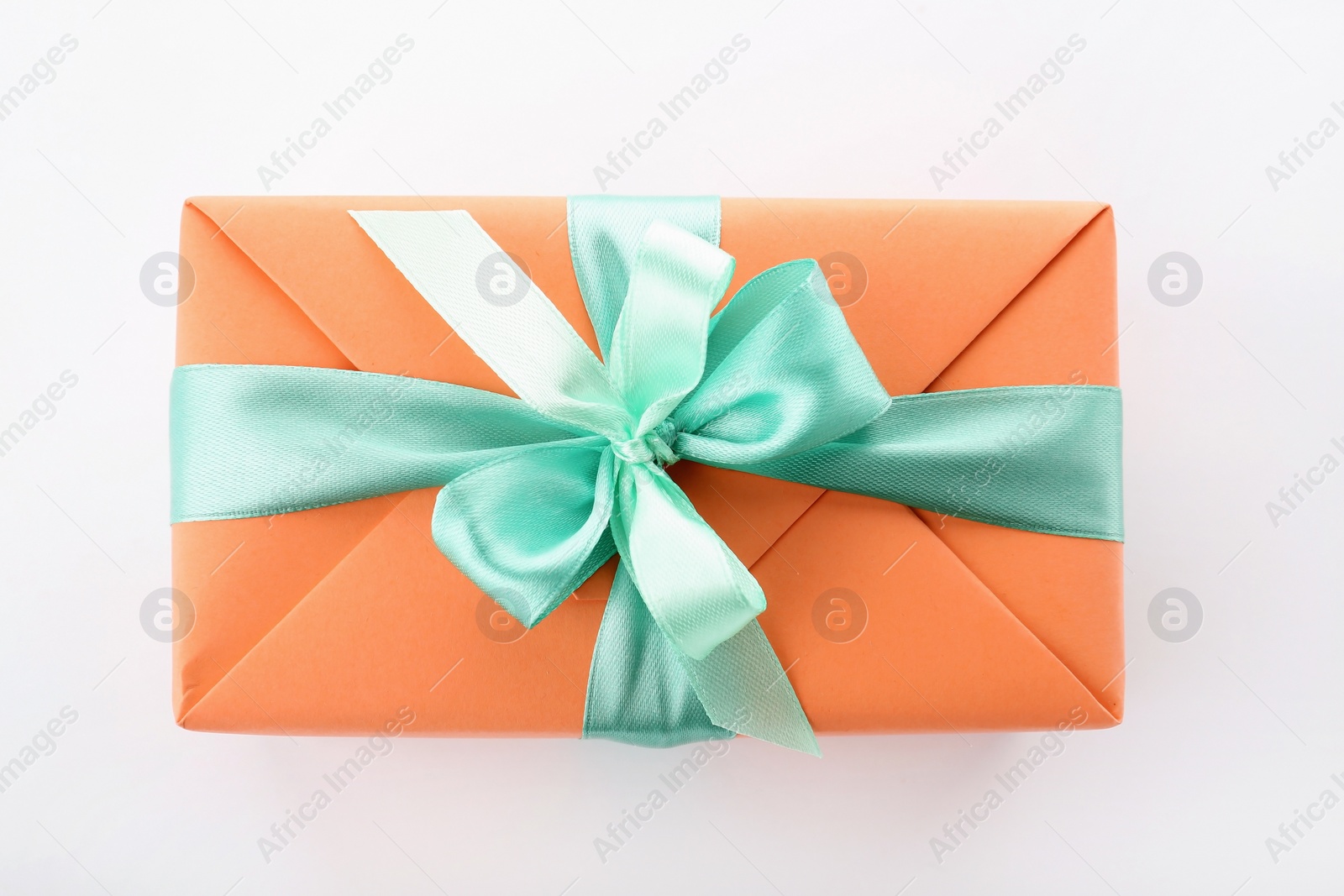 Photo of Beautiful gift box with ribbon on white background